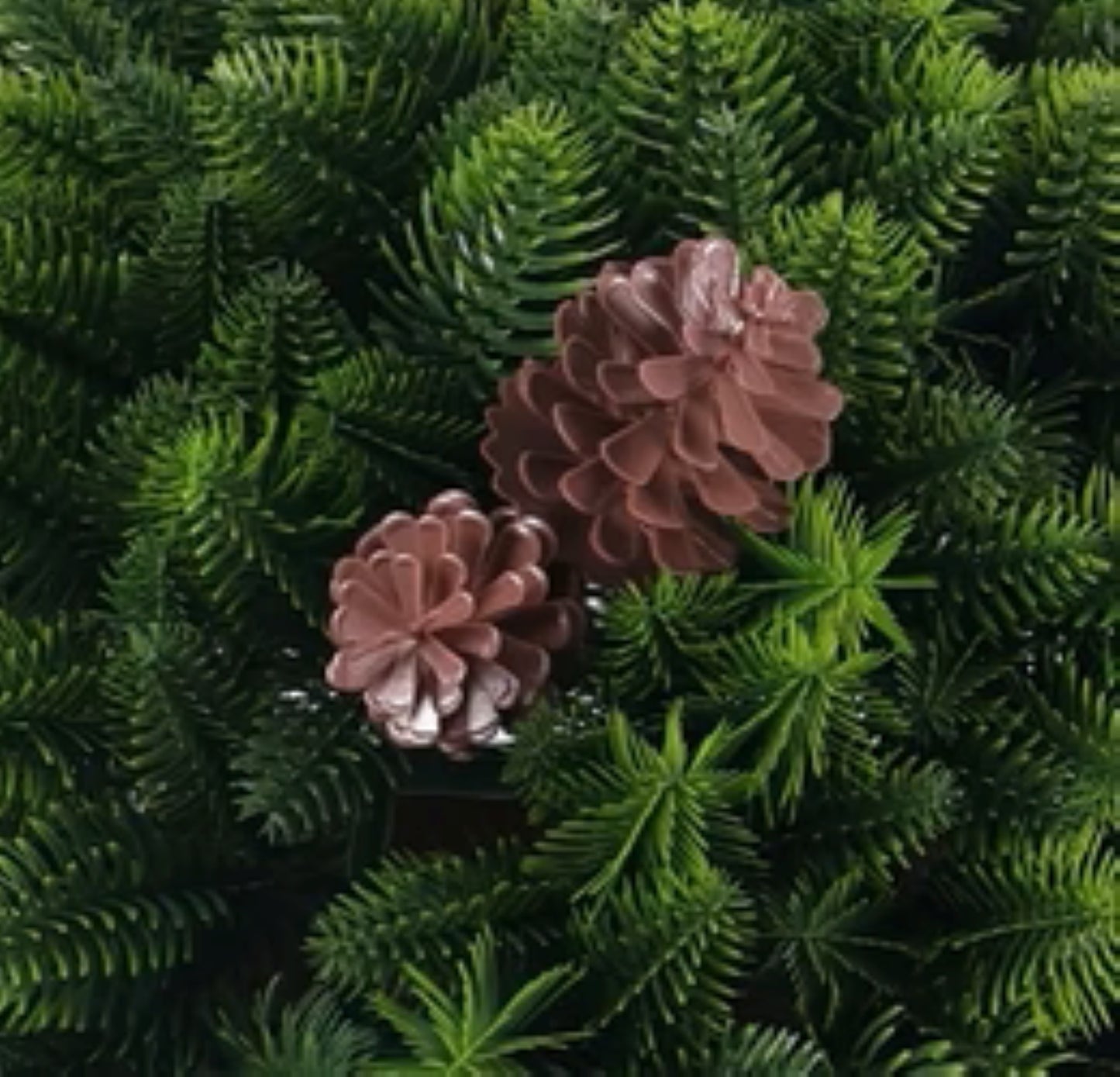 Realistic cedar and pine cone arrangement for porches and patios