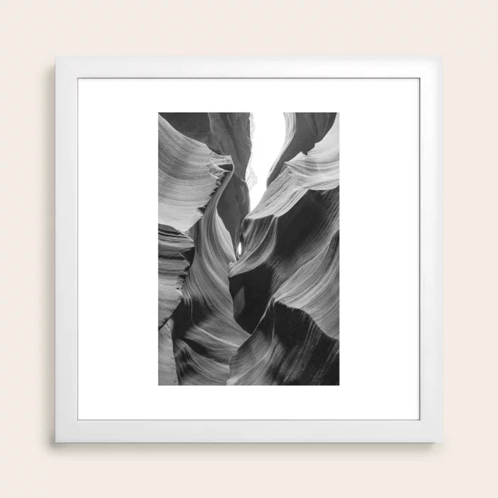 ANTELOPE CANYON XXIII Arizona Desert Art Print by Nicole Alexandria Prints framed in white hardwood, adding a clean contemporary look ideal for cafés, coastal hotels, and refined dining spaces