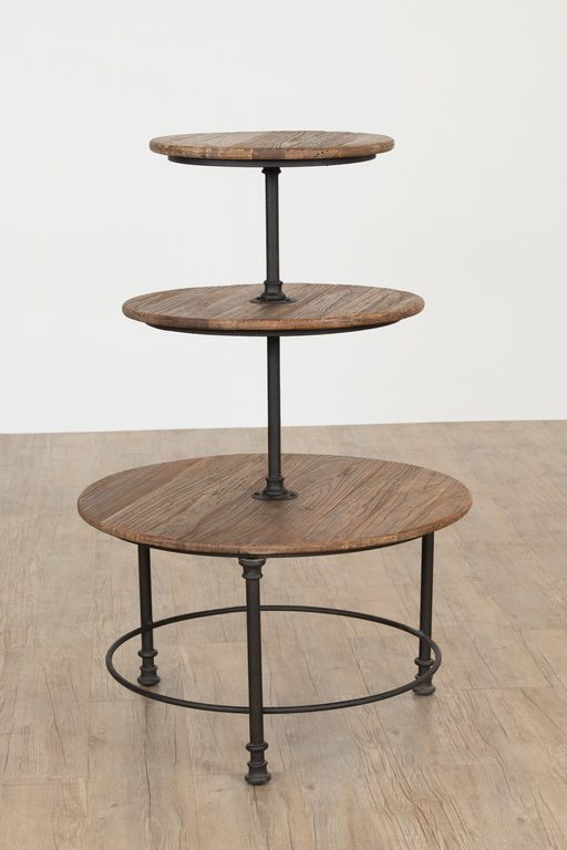 Three-tier round table with distressed pine top and metal base, ideal for rustic, vintage-style retail displays.