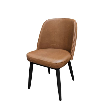 Amata chair with black faux wood frame and buckskin vinyl bucket seat.