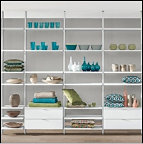 Shelving unit with decorative items against a gray wall