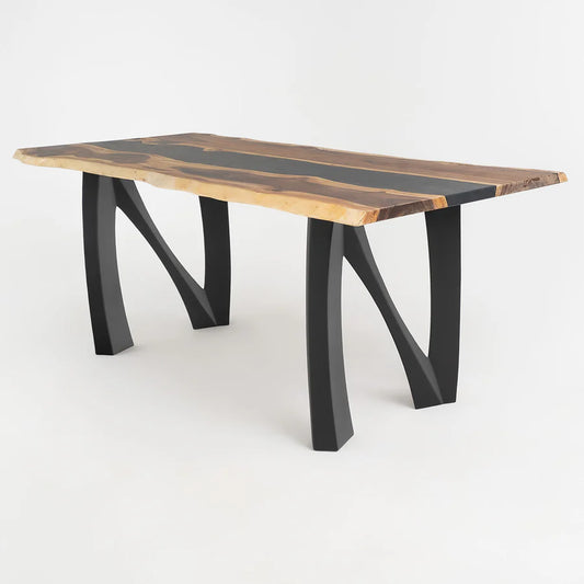 Front view of Noah Metal Table Legs featuring a sculptural alphabet-inspired steel design, matte black powder-coated finish, reinforced frame structure, and integrated adjustable levelers