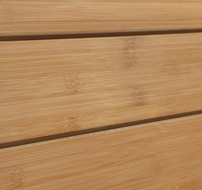Close-up of bamboo textured panel surface showing vertical bamboo-style lines.