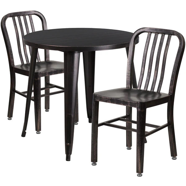 Black antique gold metal table set with vertical slat back chairs for restaurants