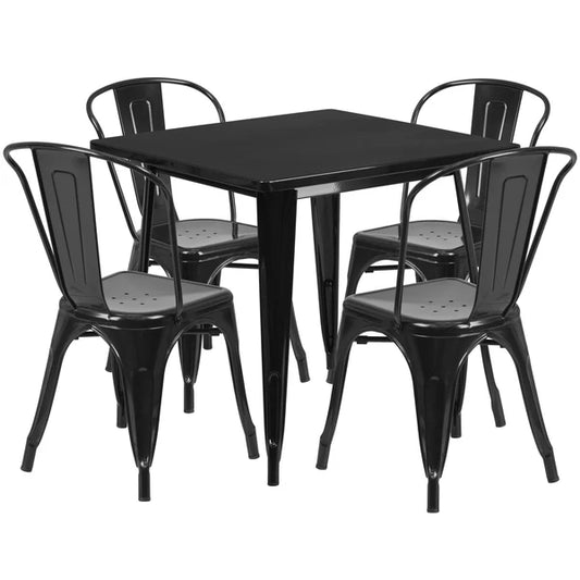 Black powder-coated metal restaurant table set with stackable chairs for bars and hotel patios