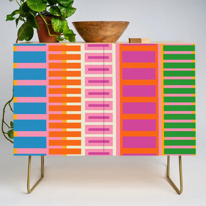 Colorful Block Stripe Condiment Bar by Kierkegaard Design Studio with gold steel legs – vibrant geometric pattern on birch ideal for hotel dining spaces, restaurant lounges, and modern cafés