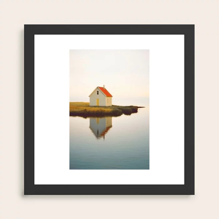 Cute Little Cabin In Iceland Art Print by Michael Schauer in black frame, modern Nordic landscape wall art perfect for restaurant lounges, hotel rooms, and café interiors.