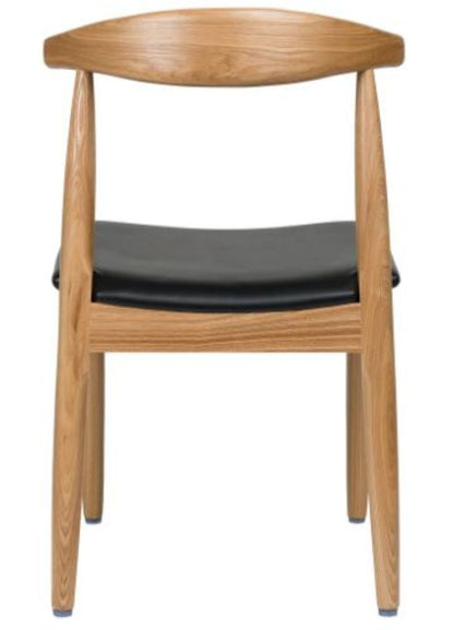 Back view of Elbow Dining Chair featuring faux wood grain metal frame, rounded back support, and smooth black vinyl seat.