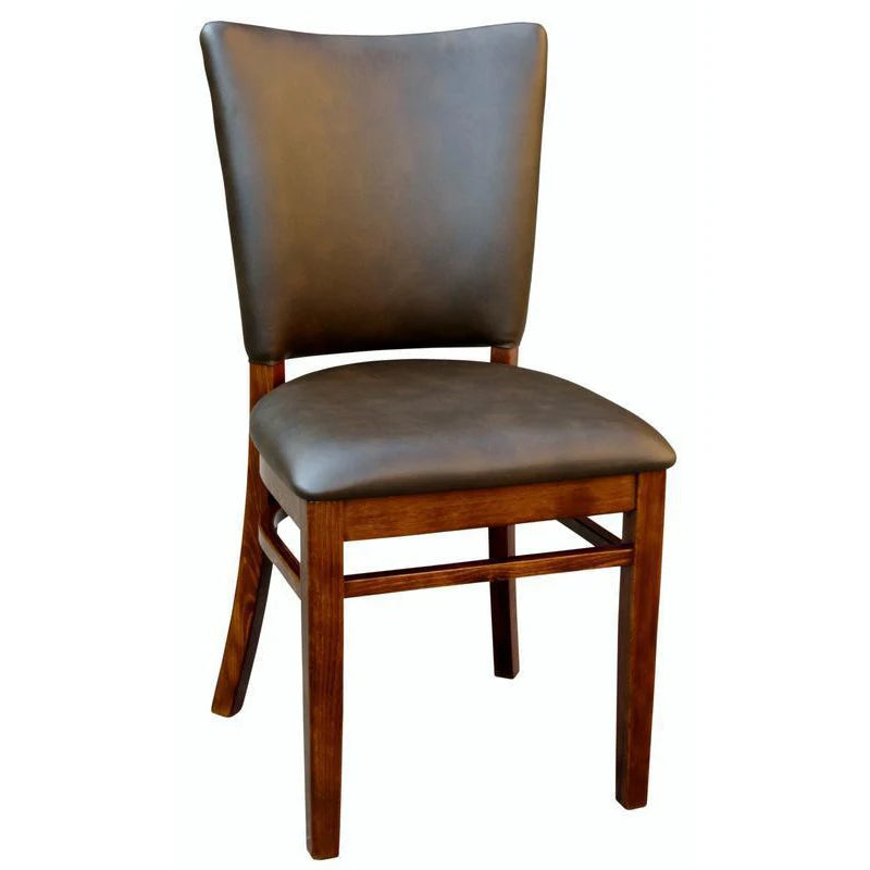 Lima upholstered beech wood dining chair in walnut finish with cream vinyl seat and back, featuring decorative nail trim detailing along the edges. Custom wood stains and upholstery colors available. Made in the USA for restaurant and hospitality interiors.