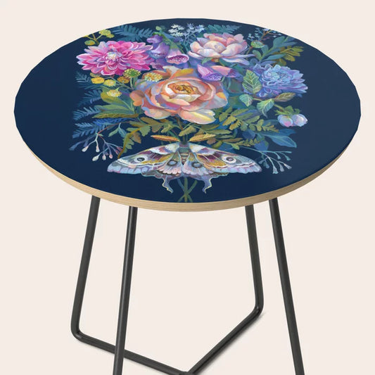 Moth Flower Bouquet Side Table by Clara McAllister with black steel legs – whimsical floral art-inspired table perfect for boutique hotels, cozy cafés, and artistic restaurant interiors