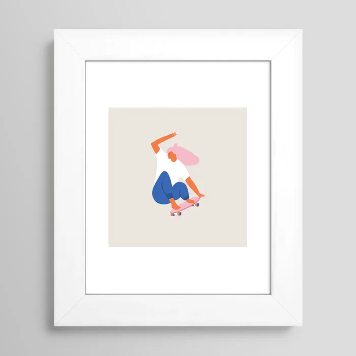 Skateboard Girl art print by Tasiania framed in clean white wood, showcasing minimalist urban artwork with vibrant tones for modern interiors