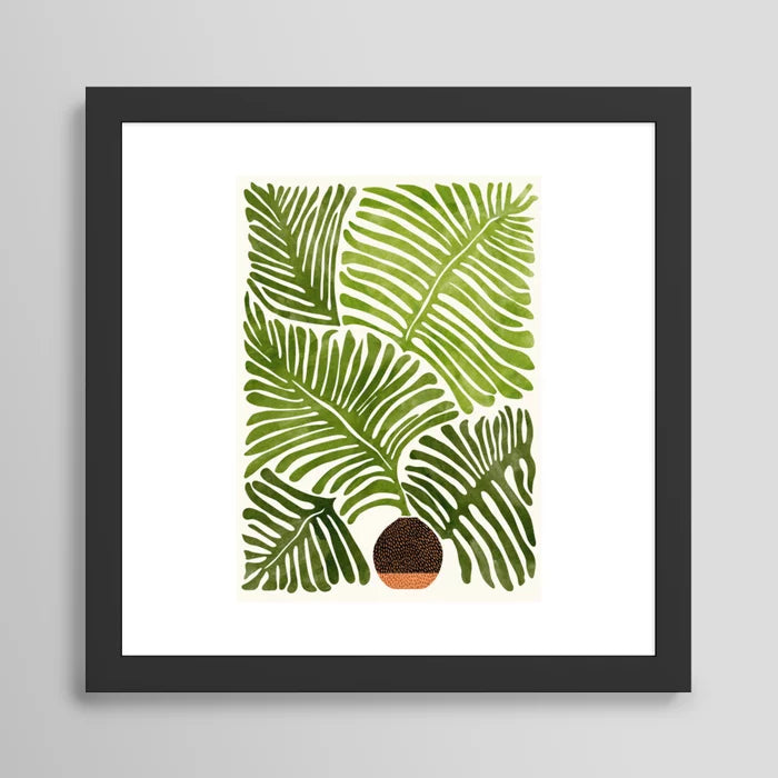 Summer Fern watercolor art print in black frame on restaurant wall
