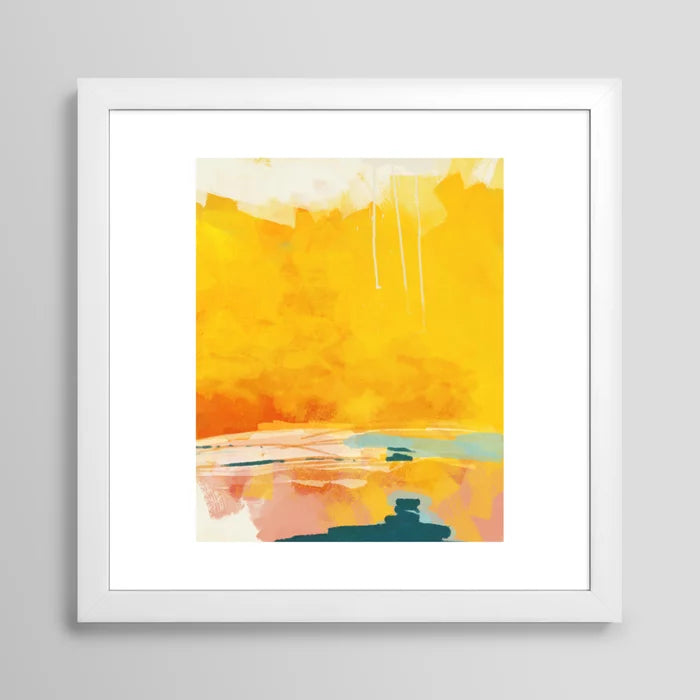 Sunny Landscape art print in white frame displayed in café seating area