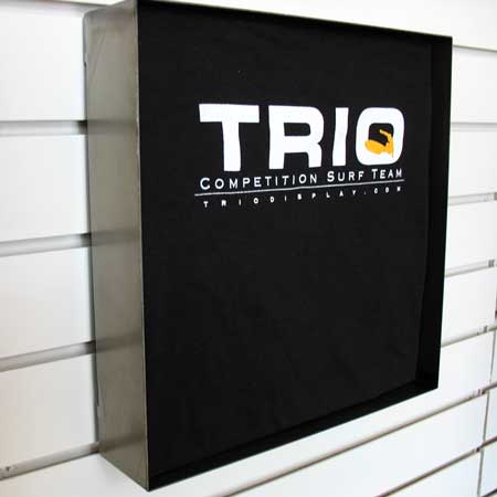 Four-sided metal t-shirt display frame in raw steel finish for showcasing folded or wrapped shirts