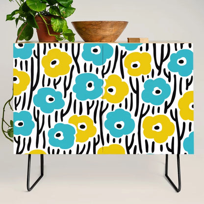 Wild Flowers Pattern Turquoise and Yellow Condiment Bar by Tony Magner with black steel legs – retro floral birch cabinet perfect for restaurant condiment stations, boutique hotels, and bar interiors